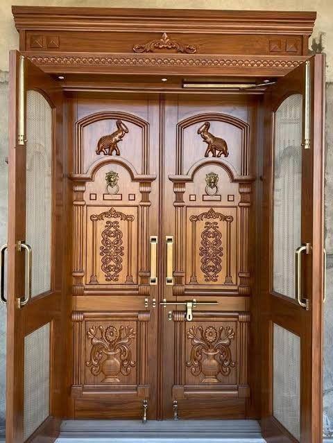 carved wooden double door.jpg