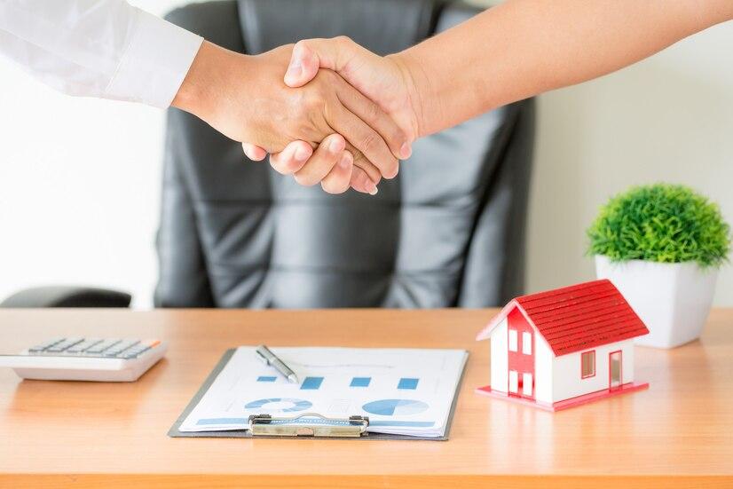 hands-agent-client-shaking-hands-after-signed-contract-buy-new-apartment_1150-14835.jpg