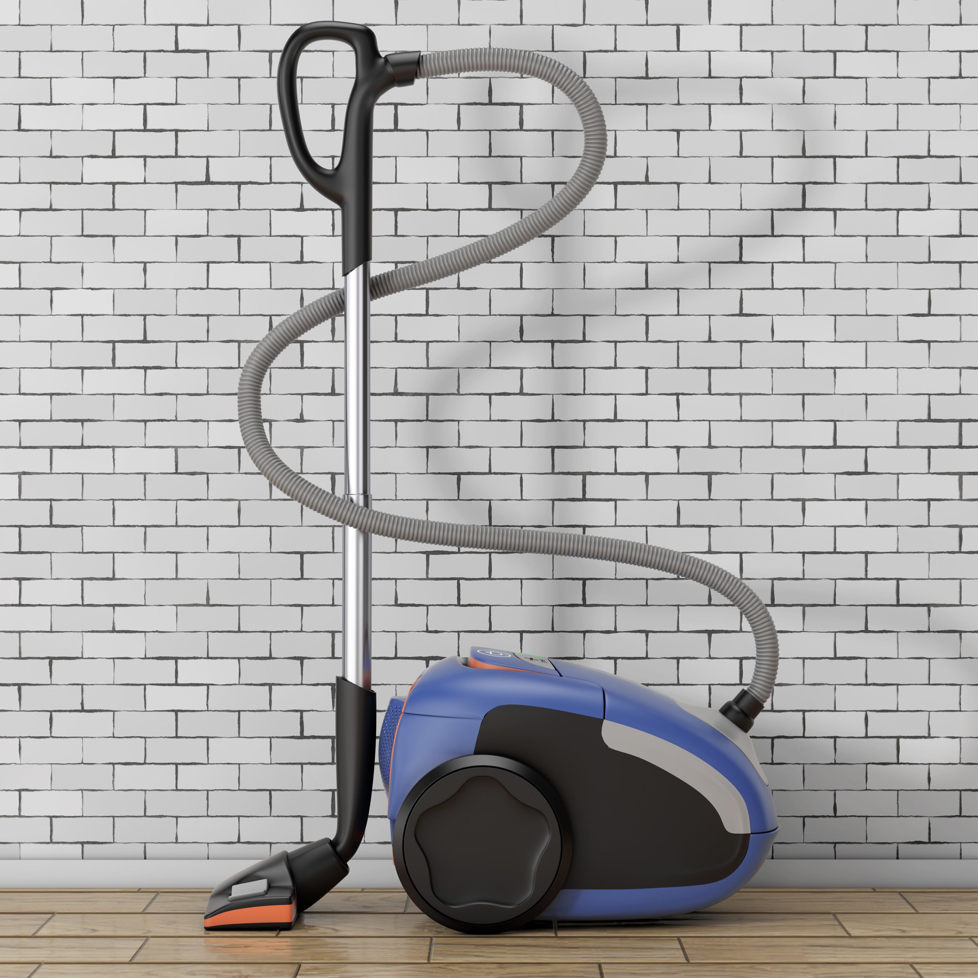 home-appliance-concept-modern-vacuum-cleaner-front-brick-wall-3d-rendering (1).jpg